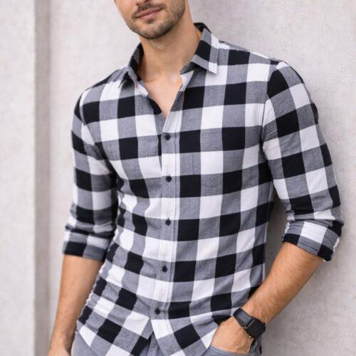 Elevate your everyday style with this Men’s Black & White Checkered Full-Sleeve Casual Shirt, featuring a timeless plaid pattern and contemporary silhouette. Designed for effortless styling, this versatile shirt is perfect for casual outings, parties, weekend gatherings, travel, college wear, dinners, and festive occasions. The classic black, white, and grey checkered pattern creates a bold yet sophisticated appearance, while the full-sleeve design adds a polished touch. Pair it with jeans, chinos, trousers, or casual sneakers to create different looks. Perfect for modern men who appreciate ethnic-fusion and contemporary fashion, this stylish checkered shirt brings confidence, versatility, and fashionable appeal to your wardrobe.