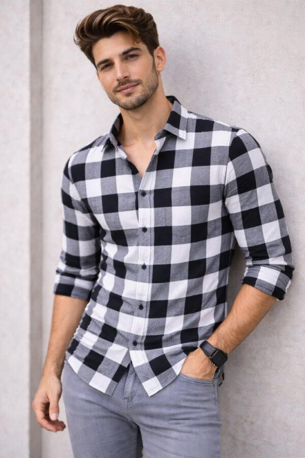 Elevate your everyday style with this Men’s Black & White Checkered Full-Sleeve Casual Shirt, featuring a timeless plaid pattern and contemporary silhouette. Designed for effortless styling, this versatile shirt is perfect for casual outings, parties, weekend gatherings, travel, college wear, dinners, and festive occasions. The classic black, white, and grey checkered pattern creates a bold yet sophisticated appearance, while the full-sleeve design adds a polished touch. Pair it with jeans, chinos, trousers, or casual sneakers to create different looks. Perfect for modern men who appreciate ethnic-fusion and contemporary fashion, this stylish checkered shirt brings confidence, versatility, and fashionable appeal to your wardrobe.